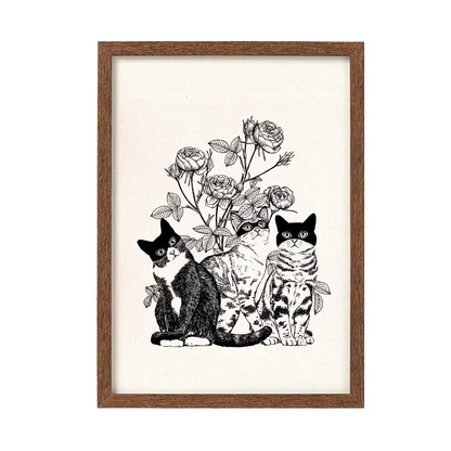 Three cats and flowers