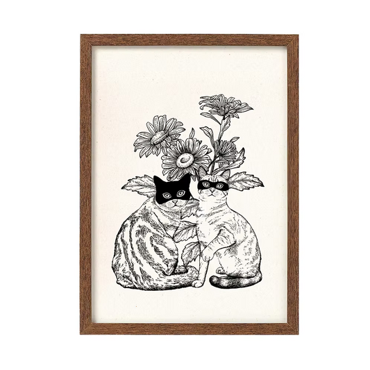 Two cats and flowers