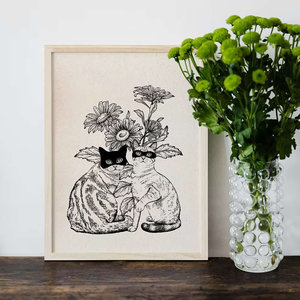 Two cats and flowers
